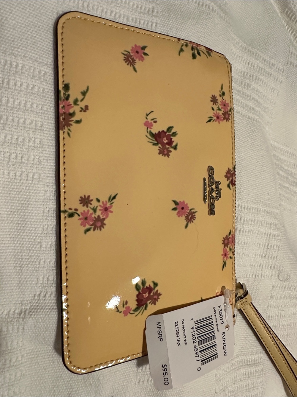 Coach Yellow Floral Patent Leather Wristlet